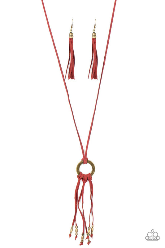 Infused with dainty brass beads, strands of Samba suede knot at the bottom of an antiqued brass ring, creating a colorfully rustic tassel at the bottom of a lengthened strand of Samba suede. Features an adjustable sliding bead closure.  Sold as one individual necklace. Includes one pair of matching earrings.