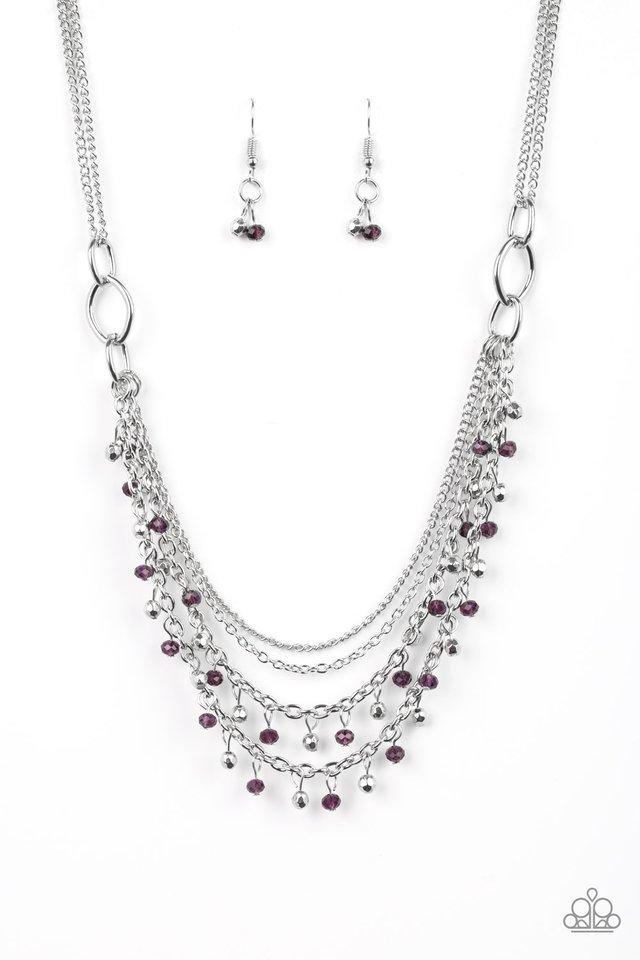 Dainty silver and purple crystal-like beads cascade from two shimmery silver chains. Infused with plain silver chains, the colorful strands layer below the collar for a flirtatious look. Features an adjustable clasp closure.  Sold as one individual necklace. Includes one pair of matching earrings.