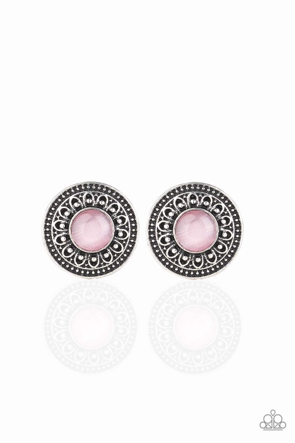 A glowing pink cat's eye stone is pressed into the center of a round silver frame embossed in blooming floral details for a seasonal vibe. Earring attaches to a standard post fitting.  Sold as one pair of post earrings.