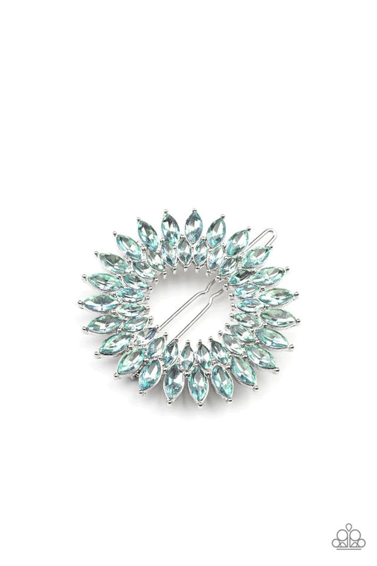 An explosion of blue marquise cut rhinestones delicately coalesce into two sparkly rings, creating a glittery centerpiece. Features a clamp barrette closure  Sold as one individual barrette.