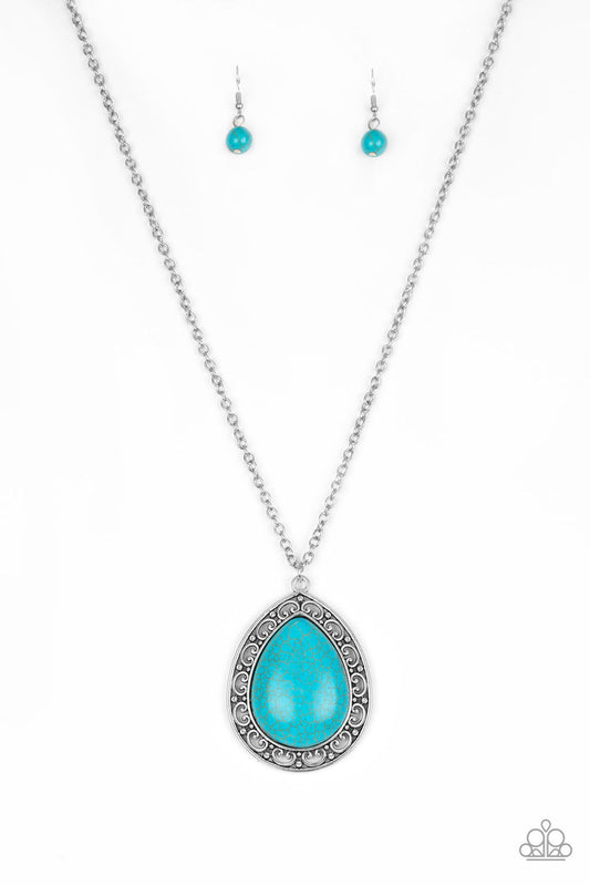 A refreshing turquoise stone teardrop is pressed into the center of an ornate silver frame, creating a dramatic pendant for a seasonal look. Features an adjustable clasp closure.  Sold as one individual necklace. Includes one pair of matching earrings.