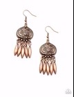 Embossed in a rustic floral pattern, a round studded copper frame gives way to a fringe of oblong copper beads for a noise-making finish. Earring attaches to a standard fishhook fitting.  Sold as one pair of earrings.