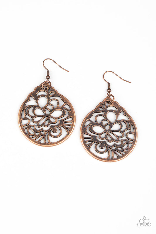 Brushed in an antiqued shimmer, a round copper frame is stenciled in an airy floral cut-out pattern for a whimsical look. Earring attaches to a standard fishhook fitting.  Sold as one pair of earrings.