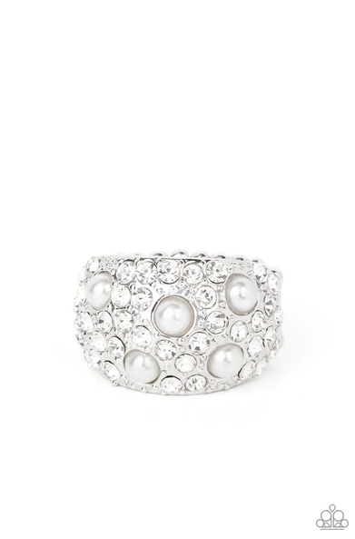 An explosion of dainty white rhinestones and bubbly white pearls are encrusted across the front of a thick silver band, creating a glamorous centerpiece atop the finger. Features a stretchy band for a flexible fit.  Sold as one individual ring.