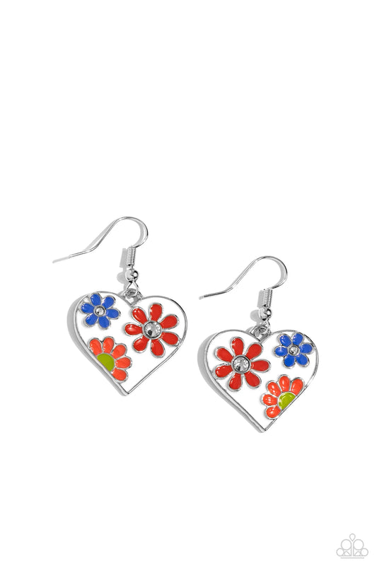 A colorful floral pattern of Burnt Sienna, coral, and Persian Jewel flowers with white rhinestone centers, and a Leek Green center is painted across the front of a white-painted heart backdrop, creating a colorful statement lure. Earring attaches to a standard fishhook fitting.  Sold as one pair of earrings.