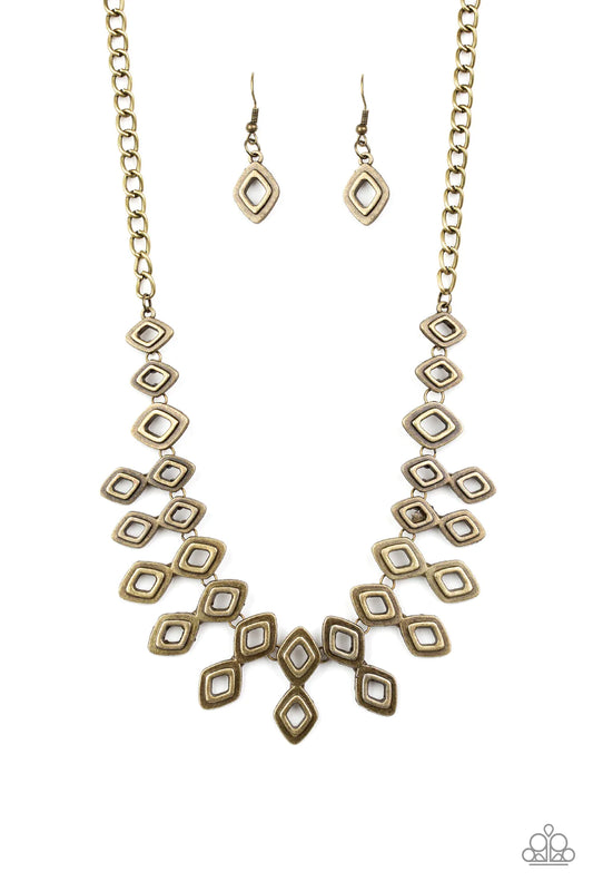 Brushed in an antiqued shimmer, glistening diamond-shaped brass frames link below the collar, coalescing into an edgy geometric fringe. Features an adjustable clasp closure.  Sold as one individual necklace. Includes one pair of matching earrings.