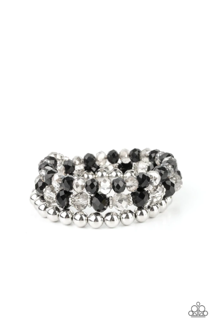 Sections of shiny silver beads and an alternating pattern of smoky and glittery black rhinestone gems gradually increase in size along a coiled wire, creating a jaw-dropping infinity wrap bracelet around the wrist.  Sold as one individual bracelet.
