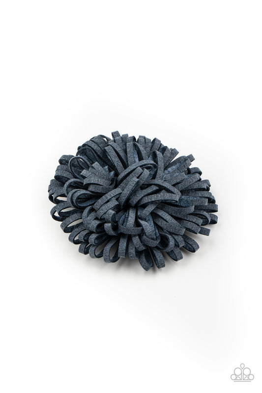 Rustic blue leather laces delicately curl into a springy blossom for a whimsical look. Features a standard hair clip on the back.  Sold as one individual hair clip.