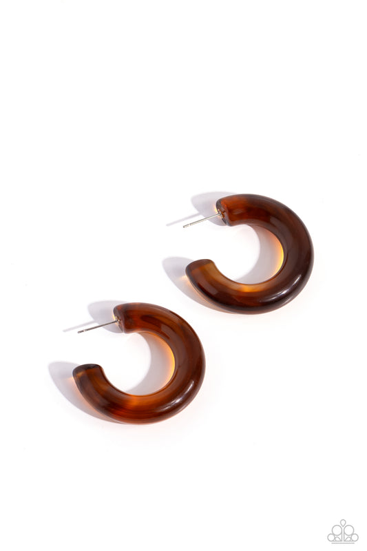 Thick, glossy brown acrylic frames snugly loop and curl just below the ear for a fashionable finish. Earring attaches to a standard post fitting. Hoop measures approximately 1 1/2" in diameter.  Sold as one pair of hoop earrings.