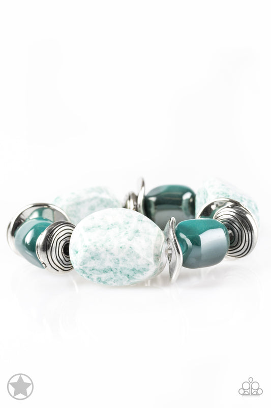 Infused along a stretchy elastic band, abstract chunky white beads with speckles of blue alternate with solitaire abstract blue beads with a gorgeous glazed finish and double layers of thick textured silver rings, creating an eye-catching, engaging display along the wrist.  Sold as one individual bracelet.