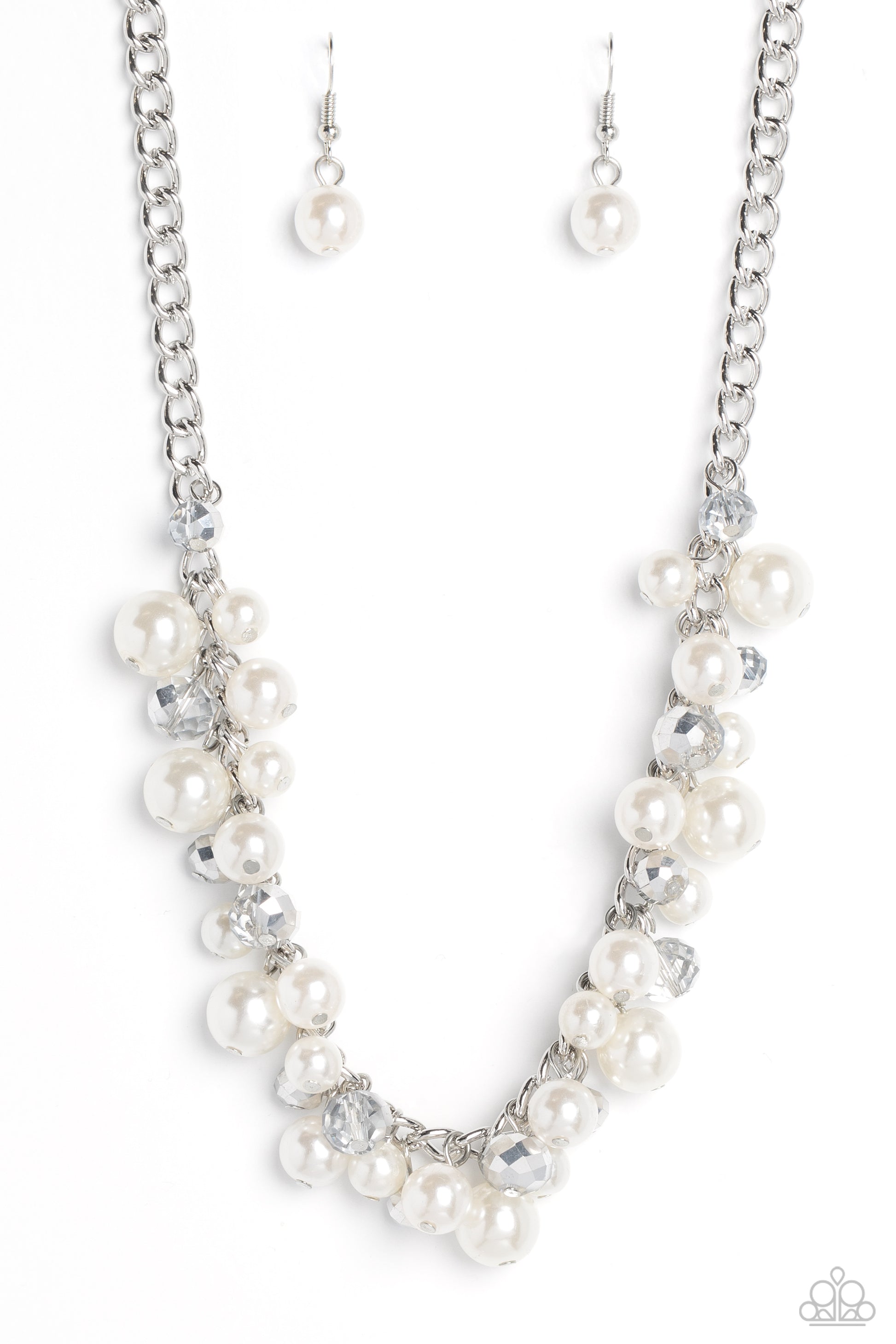 A faceted collection of glassy, silver crystal-like beads and classic white pearls in varying sizes flickers and flashes below the collar on a thick silver curb chain for a refined shimmer. Features an adjustable clasp closure.  Sold as one individual necklace. Includes one pair of matching earrings.