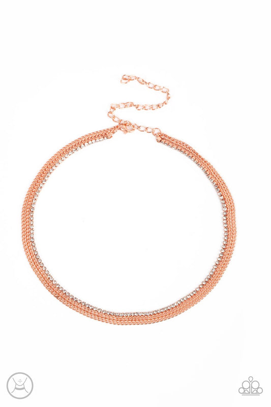 Two shiny copper chains and a single strand of dainty white rhinestones effortlessly layer around the neck, resulting in a radiant look. Features an adjustable clasp closure.  Sold as one individual choker necklace. Includes one pair of matching earrings.