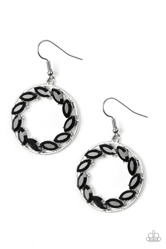 Featuring regal marquise style cuts, glittery black rhinestones are encrusted along a shimmery silver hoop for a radiant fashion. Earring attaches to a standard fishhook fitting.  Sold as one pair of earrings.