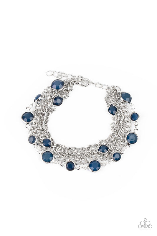 Infused with glassy blue beaded strands, layers of mismatched silver chains drape around the wrist for an ethereal pop of color. Features an adjustable clasp closure.

Sold as one individual bracelet.
