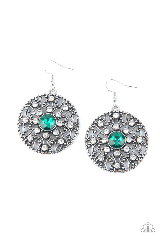 Dotted in glassy white rhinestones, a backdrop of studded silver vine-like filigree climbs a circular frame. An oversized green rhinestone embellishes the center for a whimsical finish. Earring attaches to a standard fishhook fitting.

Sold as one pair of earrings.