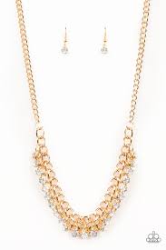 A fringe of glittery rhinestones swings from the bottom of a bold gold chain below the collar for a fierce look. Features an adjustable clasp closure.  Sold as one individual necklace. Includes one pair of matching earrings.