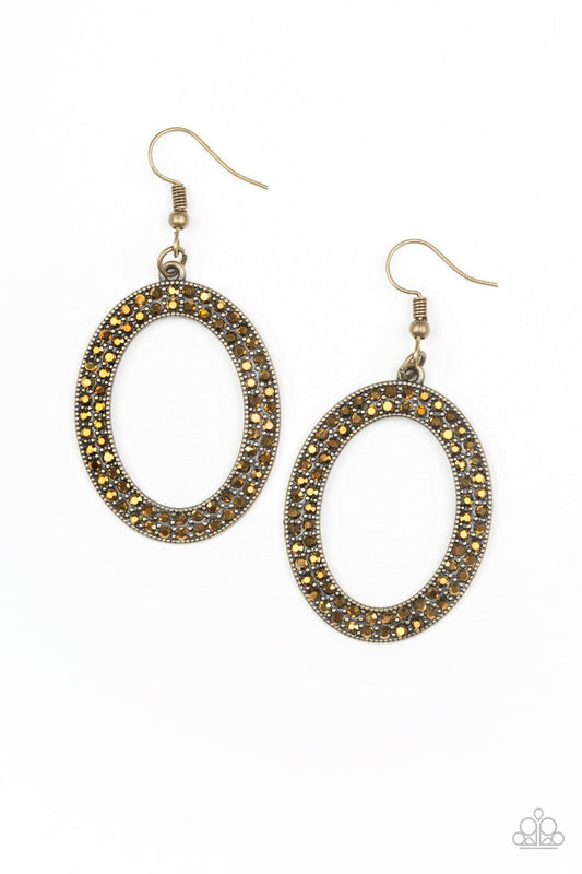 Encrusted in two rows of glassy aurum rhinestones, a shimmery brass hoop swings from the ear in a glamourous fashion. Earring attaches to a standard fishhook fitting.  Sold as one pair of earrings.