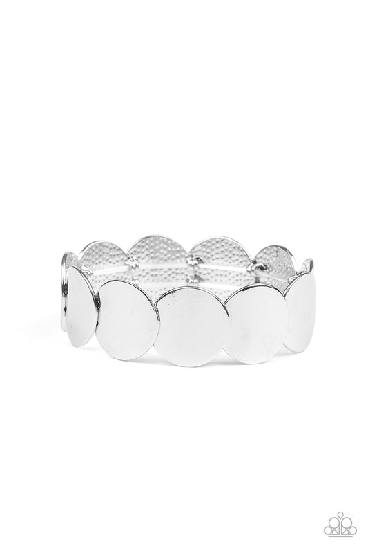 Overlapping silver discs are threaded along stretchy bands, creating a blinding shimmer around the wrist.

Sold as one individual bracelet.