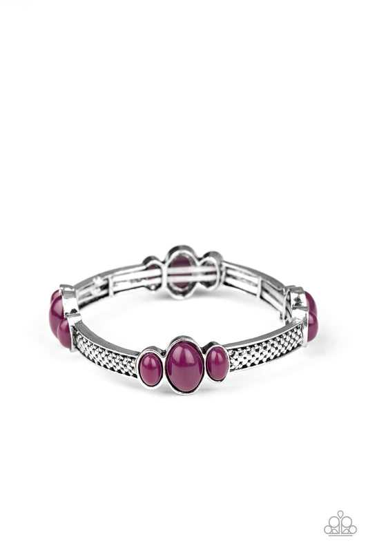 Trios of bubbly plum beads are attached to the top of textured silver bars, coalescing into decorative frames. The colorful frames are threaded along stretchy bands around the wrist for a trendy pop of color.  Sold as one individual bracelet.