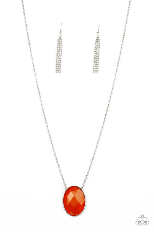 An oversized glassy Orange Tiger beaded pendant swings from the bottom of a lengthened silver chain, creating a colorful pendant. Features an adjustable clasp closure.  Sold as one individual necklace. Includes one pair of silver fringe earrings.
