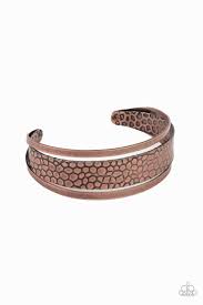 Embossed in metallic crocodile-like print, an antiqued copper cuff attaches to the center of an airy copper cuff for a wildly stacked look.  Sold as one individual bracelet.