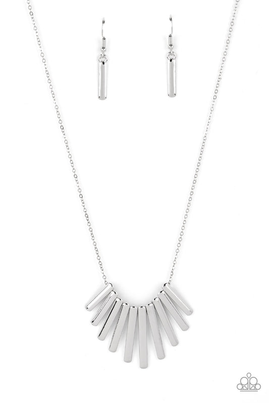 A collection of high-sheen silver frames glide along a dainty silver chain below the collar, stacking into a bowing fringe for a monochromatic masterpiece. Features an adjustable clasp closure.  Sold as one individual necklace. Includes one pair of matching earrings.