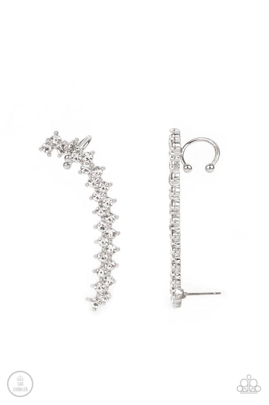 Encased in studded silver fittings, pairs of glassy white rhinestones stack into a zigzagging frame up the ear for an electrifying fashion. Features a dainty cuff attached to the top for a secure fit.  Sold as one pair of ear crawlers.