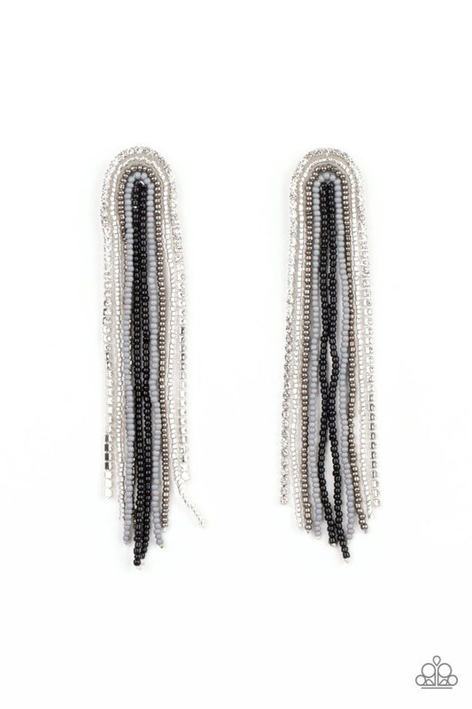 Mismatched strands of black, silver, gray, clear, and gunmetal seed beads and a glittery strand of white rhinestones delicately curls into a beaded rainbow-like tassel. Earring attaches to a standard post fitting.  Sold as one pair of post earrings.