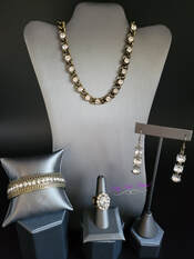 Inspired by the magnificent Mile in Chicago, the Magnificent Mile trend blend mixes classic trends with urban elements giving it an industrial vibe. Includes one of each accessory featured in the Magnificent Musings Trend Blend in Mays Fashion Fix:  Necklace:&nbsp; "Major Moxie"  Earrings:&nbsp; "Determined to Dazzle"  Bracelet: "Grit Goals"  Ring: "Moxie Magic"