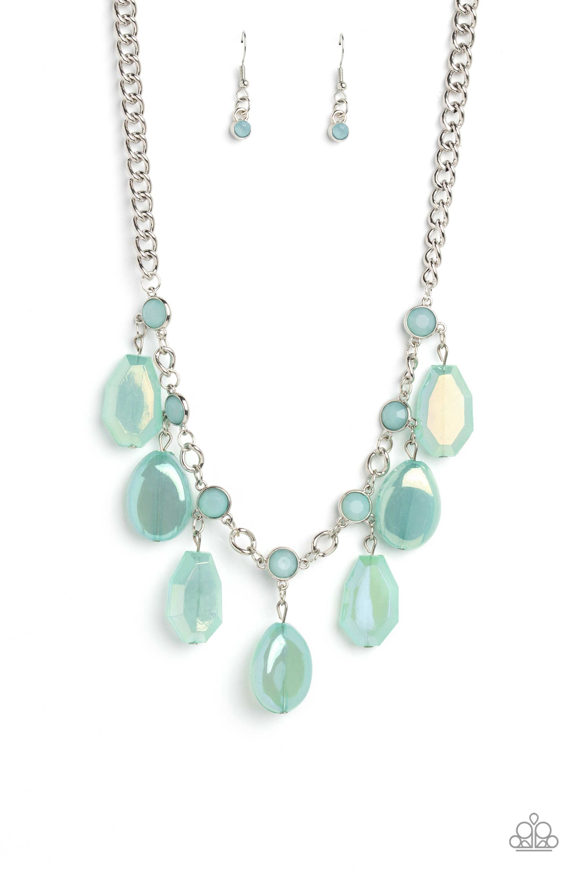 A collection of chiseled, clear and milky geometric shapes in Waterspout hues feature an iridescent overlay as they cascade from a silver curb chain, resulting in a bubbly and boisterous fringe below the collar. A layer of faceted milky Waterspout beads are infused along the silver chain for an additional pop of color. Features an adjustable clasp closure.  Sold as one individual necklace. Includes one pair of matching earrings.