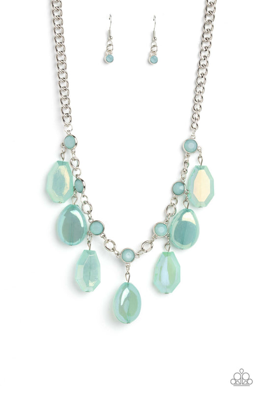 A collection of chiseled, clear and milky geometric shapes in Waterspout hues feature an iridescent overlay as they cascade from a silver curb chain, resulting in a bubbly and boisterous fringe below the collar. A layer of faceted milky Waterspout beads are infused along the silver chain for an additional pop of color. Features an adjustable clasp closure.  Sold as one individual necklace. Includes one pair of matching earrings.