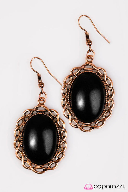 Women's black stone in copper setting