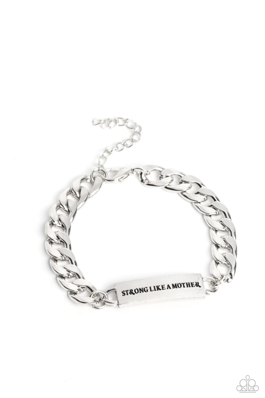 Attached to a thick, silver curb chain, a rectangular plate is stamped with the phrase "strong like a mother," for a sentimental, urban statement around the wrist. Features an adjustable clasp closure.  Sold as one individual bracelet.