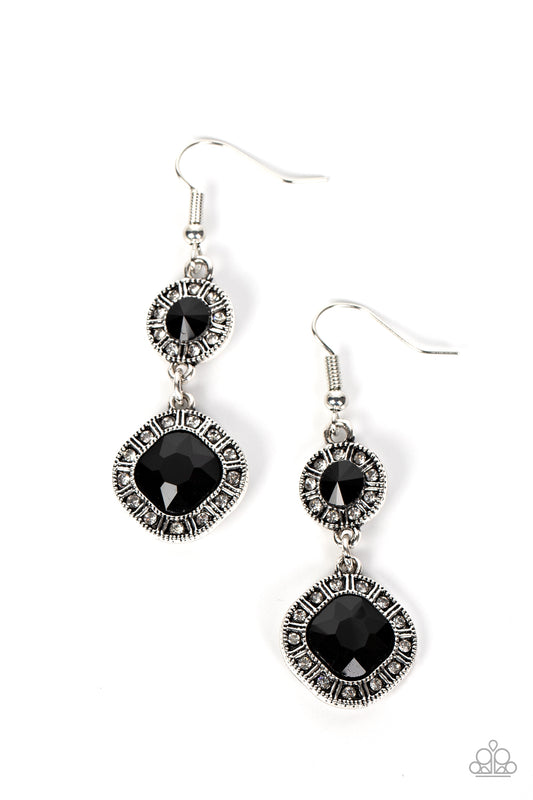 Separated by silver bars, dainty white rhinestones circle into studded borders around a pair of round and radiant cut black rhinestone centers that delicately link into an extravagant lure. Earring attaches to a standard fishhook fitting.  Sold as one pair of earrings.