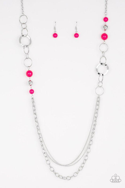 Vivacious pink beads, shiny silver beads, and glistening silver hoops give way to mismatched silver chains for a whimsical look. Features an adjustable clasp closure.

Sold as one individual necklace. Includes one pair of matching earrings.
