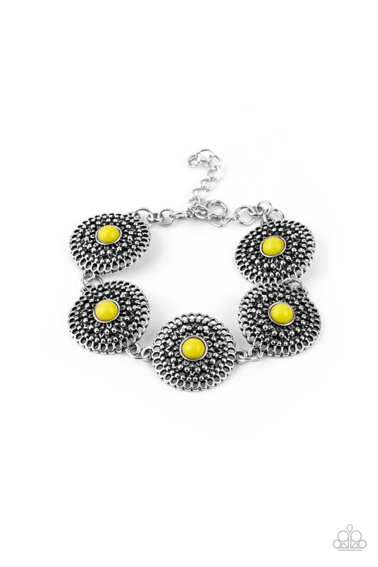 Dotted with dainty yellow beaded centers, shimmery studded silver floral frames delicately link around the wrist for a colorfully whimsical look. Features an adjustable clasp closure.

Sold as one individual bracelet.