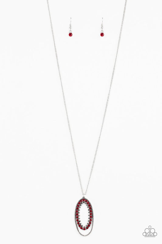 Ringed in a studded silver frame, glittery red and hematite rhinestones collect into a glamorous pendant at the bottom of a lengthened silver chain for a refined flair. Features an adjustable clasp closure.  Sold as one individual necklace. Includes one pair of matching earrings.