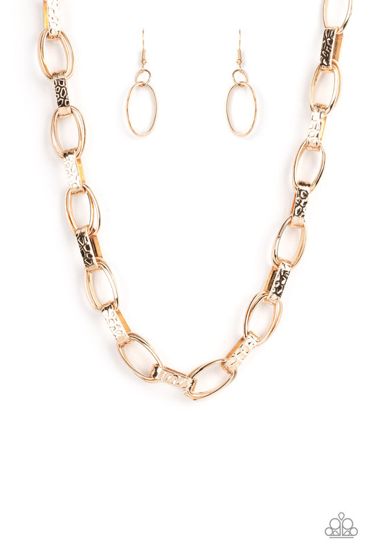 Wide hammered gold links alternate with double sets of shiny gold links as they connect across the collar for an edgy industrial effect. Features an adjustable clasp closure.  Sold as one individual necklace. Includes one pair of matching earrings.
