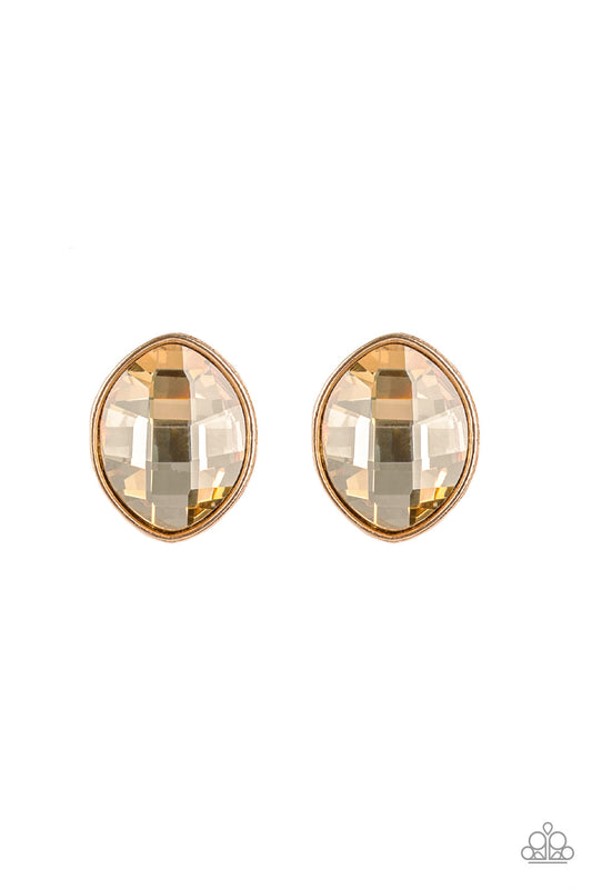 Featuring a faceted finish, an oversized marquise-shaped gem is nestled in a sleek gold frame for an undeniably statement-making look. Earring attaches to a standard post fitting.  Sold as one pair of post earrings.