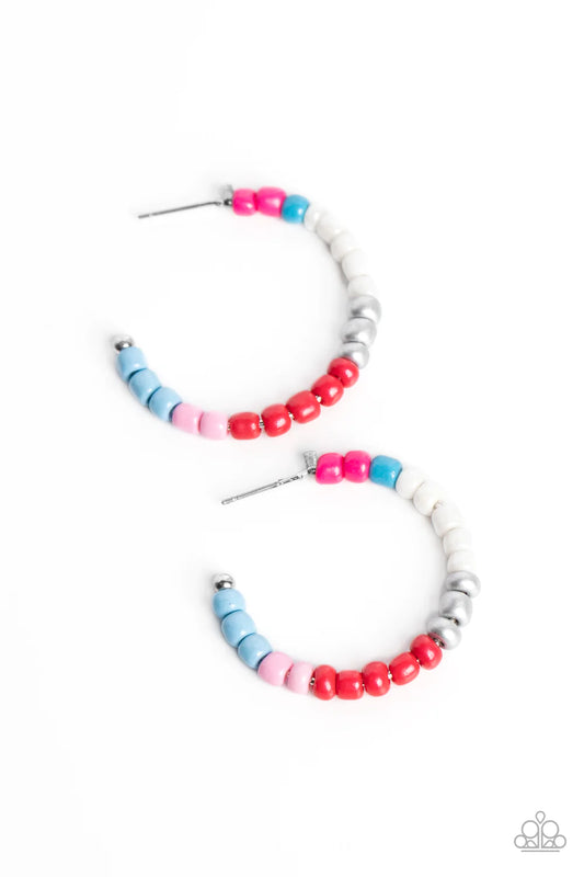 A colorful strand of hot pink, blue, white, silver, red, light pink, and baby blue seed beads follow the curve of a silver hoop, creating a colorfully charismatic look. Earring attaches to a standard post fitting. Hoop measures approximately 1 1/4" in diameter.  Sold as one pair of hoop earrings.