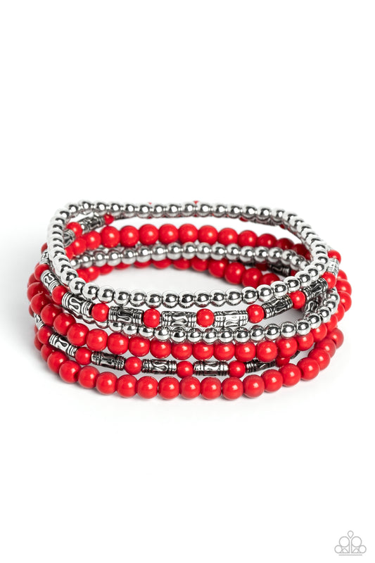 A trendy collection of red, silver and silver cylindrical textured beads wrap around the wrist on elastic stretchy bands for a colorful, seasonal stack.  Sold as one set of six bracelets.