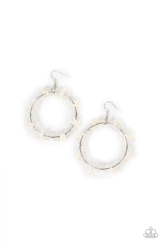 Dainty crystal-like beads and white shell-like pieces are threaded along dainty wires, creating glitzy loops around an oversized silver ring for a beach inspired fashion. Earring attaches to a standard fishhook fitting.  Sold as one pair of earrings.