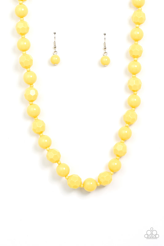 Infused with dainty yellow beads, a bubbly collection of smooth and faceted yellow beads alternate along an invisible wire below the collar for a sunny pop of color. Features an adjustable clasp closure.  Sold as one individual necklace. Includes one pair of matching earrings.