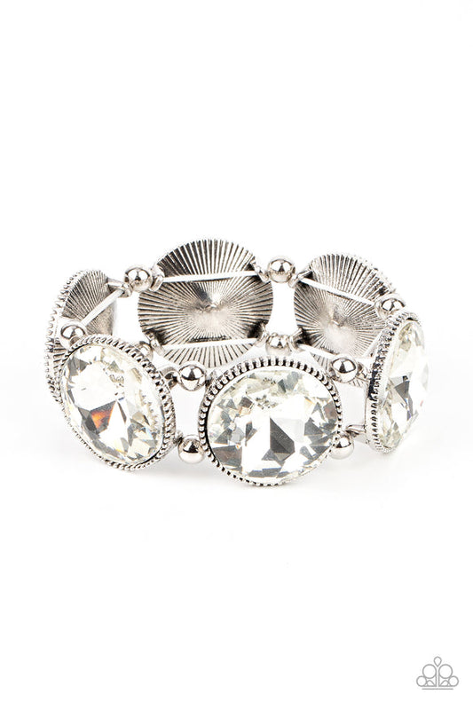 Women's silver stretchy bracelet with round white rhinestones