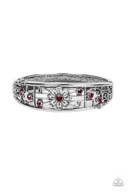 Slanted trios of dazzling pink rhinestones flank a whimsical white rhinestone dotted floral center, resulting in an airily layered bangle-like bracelet around the wrist. Features a hinged closure.

Sold as one individual bracelet.