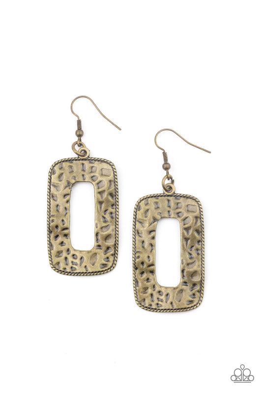 Bordered in metallic rope-like details, a brass rectangular frame has been hammered in antiqued textures for a rustically radiant look. Earring attaches to a standard fishhook fitting.  Sold as one pair of earrings.