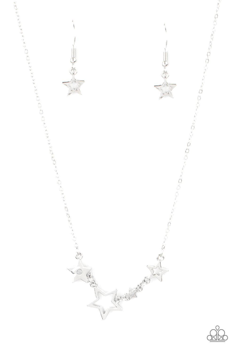 A mismatched collection of airy silver stars and white rhinestone dotted star frames delicately link below the collar, creating a stellar patriotic inspired pendant. Features an adjustable clasp closure.  Sold as one individual necklace. Includes one pair of matching earrings.