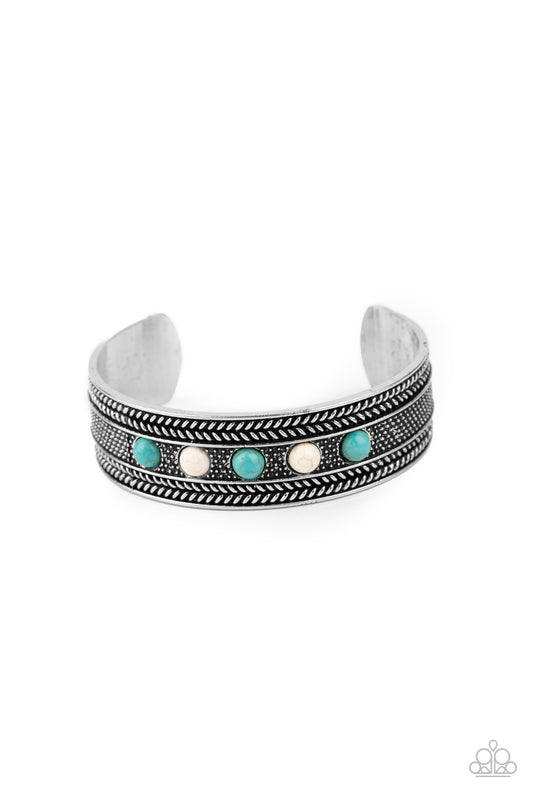 Dainty turquoise and white stone beads are encrusted along the front of an ornate silver cuff studded and embossed in antiqued rope-like patterns.  Sold as one individual bracelet.
