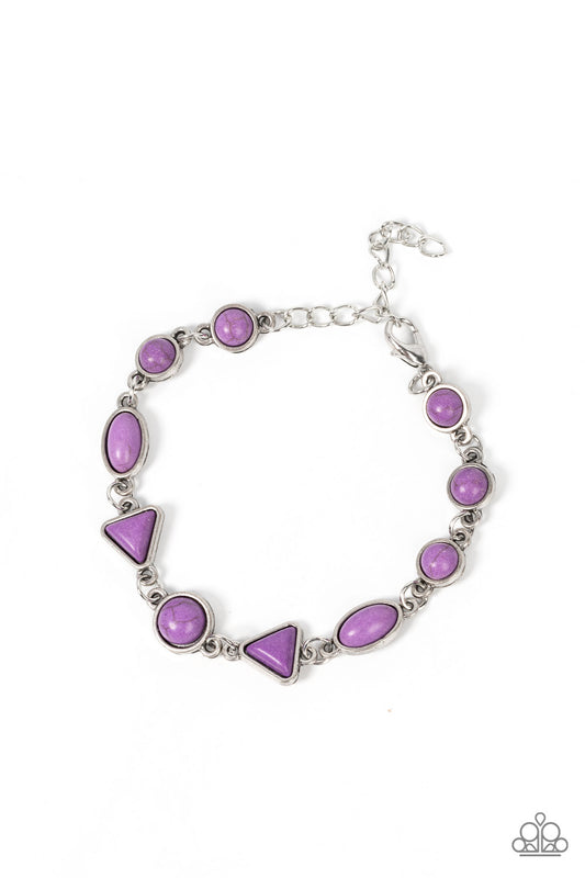 Encased in rustic silver frames, a vivacious assortment of triangular, oval, and round purple stones delicately links into an artisan-inspired centerpiece around the wrist. Features an adjustable clasp closure.  Sold as one individual bracelet.