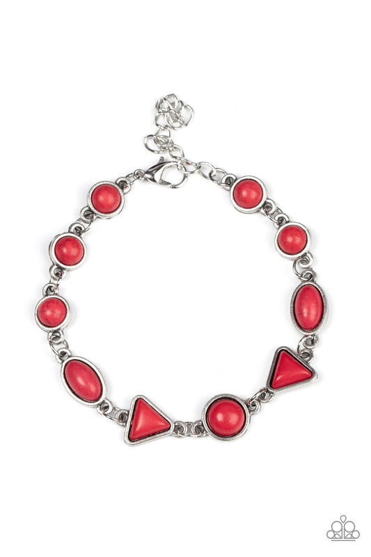 Encased in rustic silver frames, an earthy assortment of triangular, oval, and round red stones delicately links into an artisan-inspired centerpiece around the wrist. Features an adjustable clasp closure.  Sold as one individual bracelet.